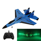 Blue remote control jet toy with black controller and green LED lights display