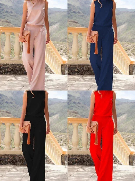 Woman modeling sleeveless pants set in pink, navy, black, and red with relaxed fit