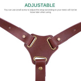 Adjustable brown leather strap with brass hardware and reinforced stitching, close-up view