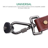 Brown leather camera strap with metal hardware and universal screw attachment