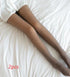 Sheer nude tights with a smooth finish and slim fit, styled with white satin shorts on bed.