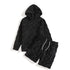 Black textured hoodie and shorts set, soft plush material, relaxed fit streetwear
