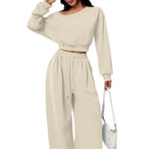 Beige oversized lounge set with wide-leg pants and cropped long sleeve top