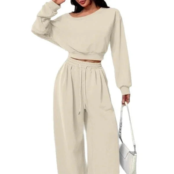 Beige oversized lounge set with wide-leg pants and cropped long sleeve top