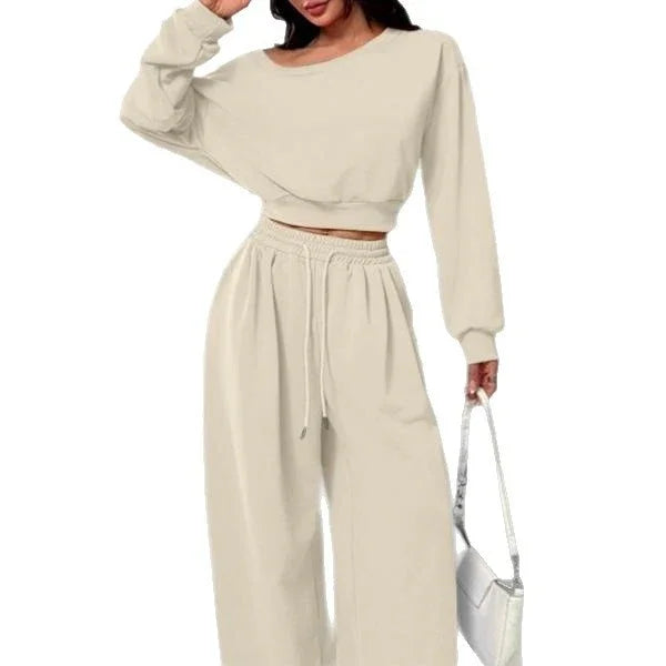 Beige oversized lounge set with wide-leg pants and cropped long sleeve top