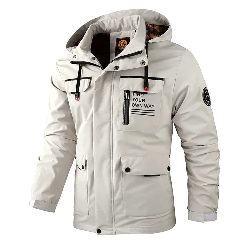 Men's light gray streetwear jacket with hood, zipper pockets, and printed graphic on chest