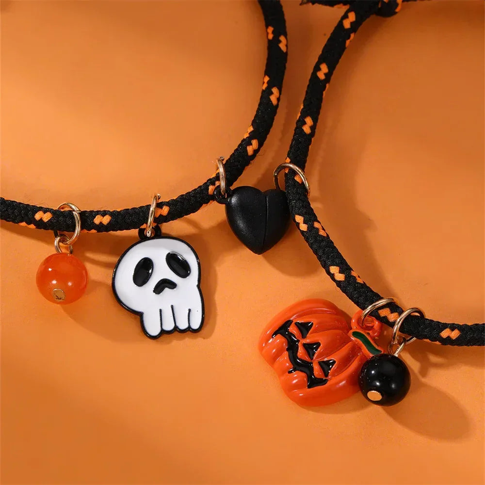 Black and orange braided bracelets with Halloween skull and pumpkin charms, casual style