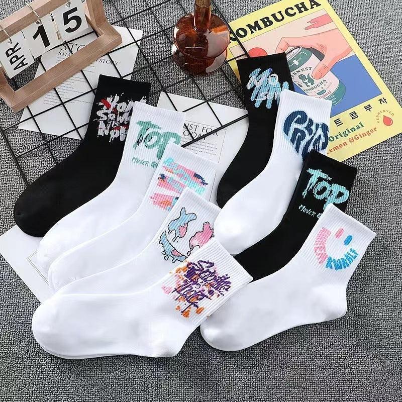 Colorful streetwear cotton socks with bold graphic prints, available in black and white, crew fit