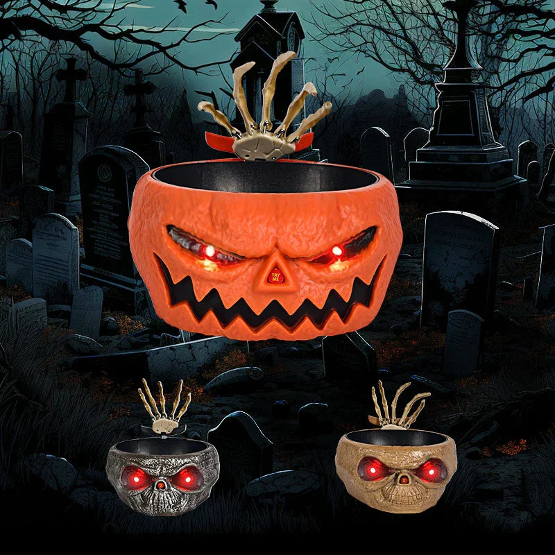 Halloween candy bowls shaped like skulls and pumpkins with glowing red eyes and skeleton hand design