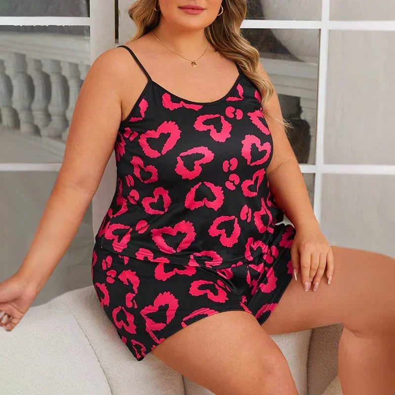Plus size satin cami shorts set with black and pink heart print, relaxed fit loungewear