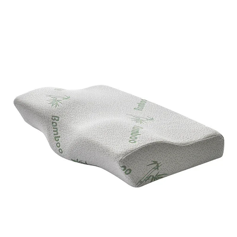 Ergonomic memory foam pillow with grey bamboo cover and contoured design for neck support
