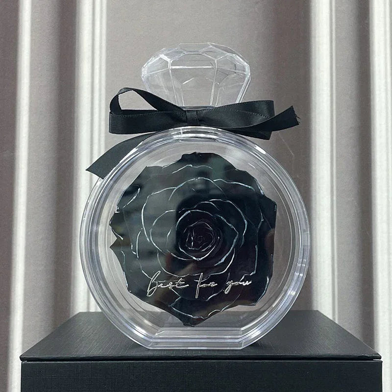 Black preserved rose in clear diamond-shaped case with black ribbon, modern gift decor