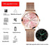 Rose gold mesh strap watch with pink dial, luminous hands, and calendar display
