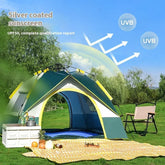 Green and yellow pop-up tent with silver-coated UV protection, outdoor picnic setting