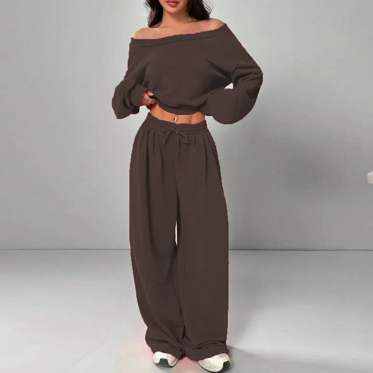 Woman wearing loose brown off-shoulder top and wide-leg pants matching set
