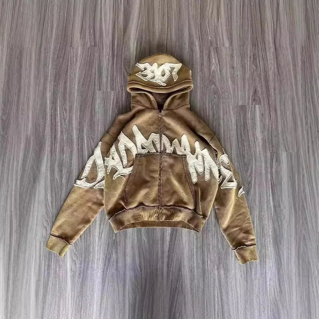 Brown oversized hoodie with bold white graffiti print, streetwear cotton pullover fit