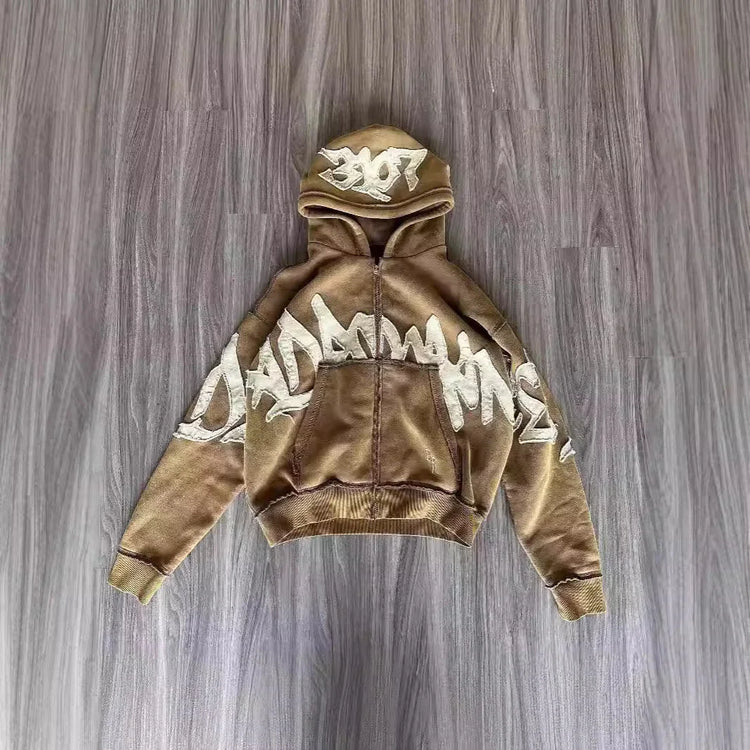 Brown oversized hoodie with bold white graffiti print, streetwear cotton pullover fit