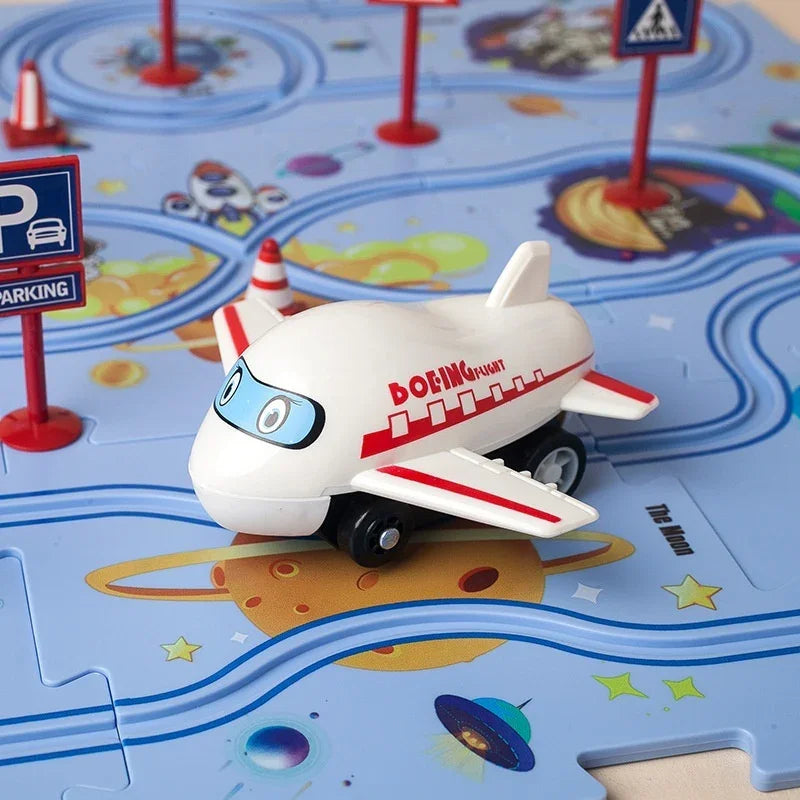 White and red toy airplane on a colorful play mat with cartoon traffic signs and planets.