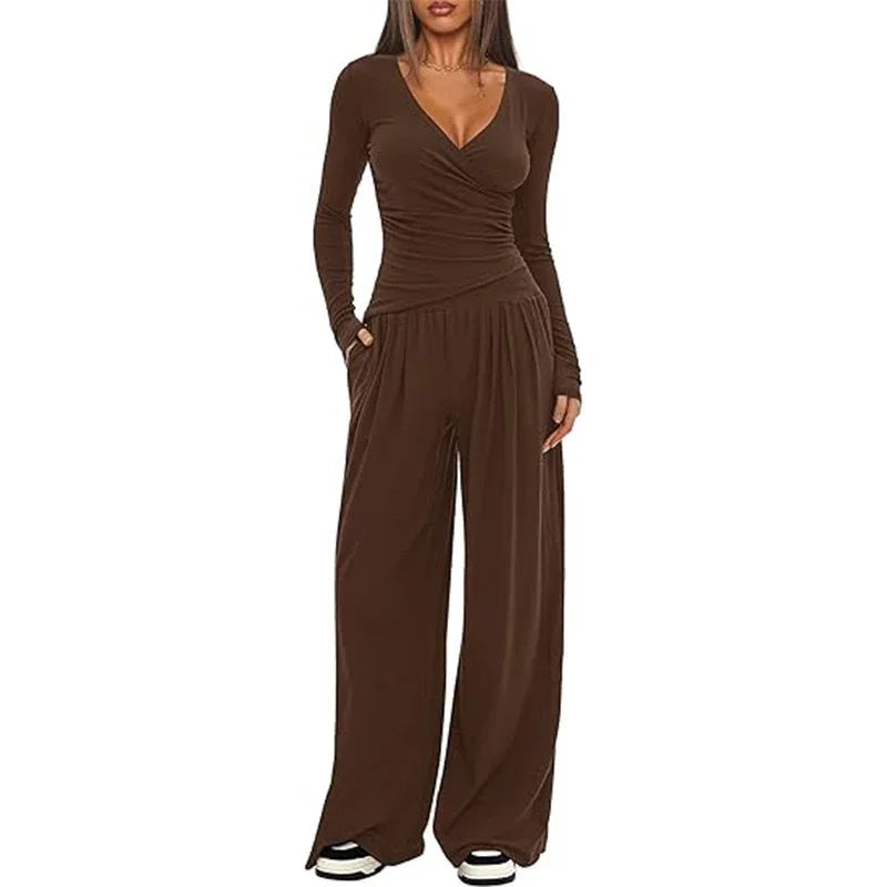 Woman wearing brown long sleeve jumpsuit with wide leg pants and relaxed fit
