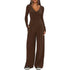 Woman wearing brown long sleeve jumpsuit with wide leg pants and relaxed fit