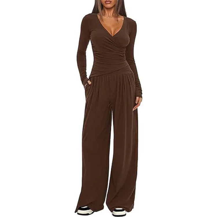 Woman wearing brown long sleeve jumpsuit with wide leg pants and relaxed fit