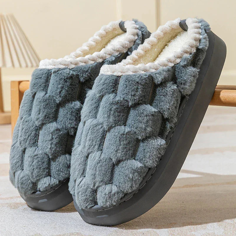 Gray plush fleece slippers with basket weave texture and cozy white lining, slip-on style