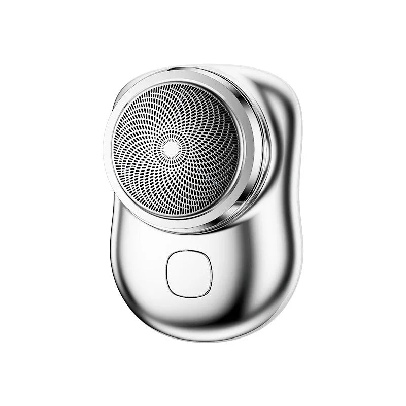 Sleek silver handheld electric shaver with circular blade and ergonomic fit