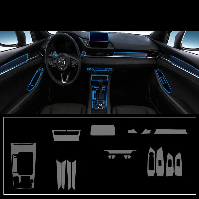 Futuristic car interior with black panels, blue LED trim, and dashboard accent details