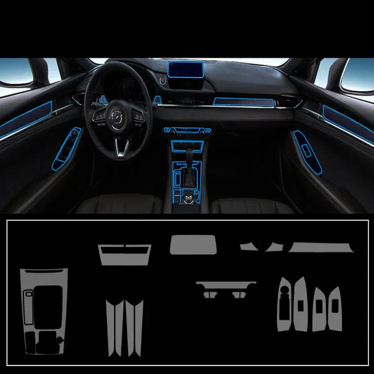 Futuristic car interior with black panels, blue LED trim, and dashboard accent details