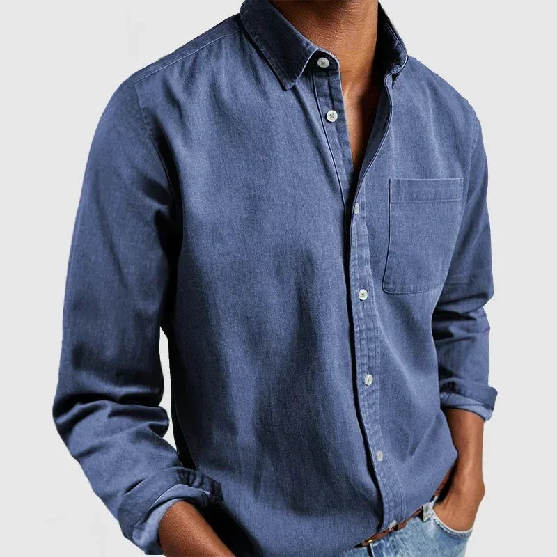 Men's blue denim button-up shirt with chest pocket and relaxed fit, long sleeves