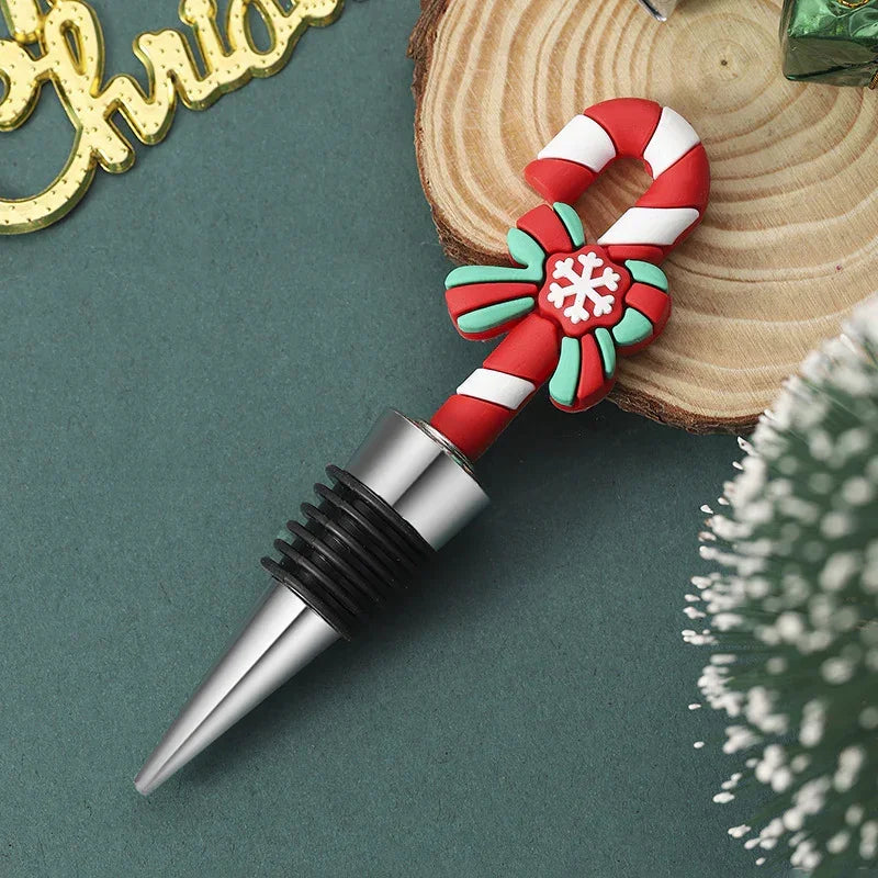 Christmas candy cane wine stopper with red and white stripes and festive bow