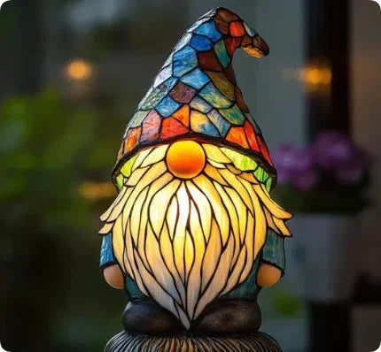 Whimsical gnome lamp with colorful stained glass hat and illuminated beard, cozy decor accent