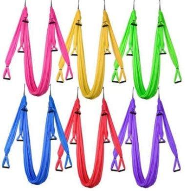 Colorful nylon yoga swings with handles, displayed in pink, yellow, green, blue, red, and purple.