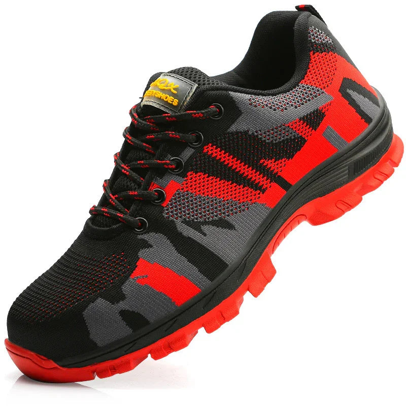 Athletic sneaker with black, grey, and red mesh upper, red sole, and lace-up closure.