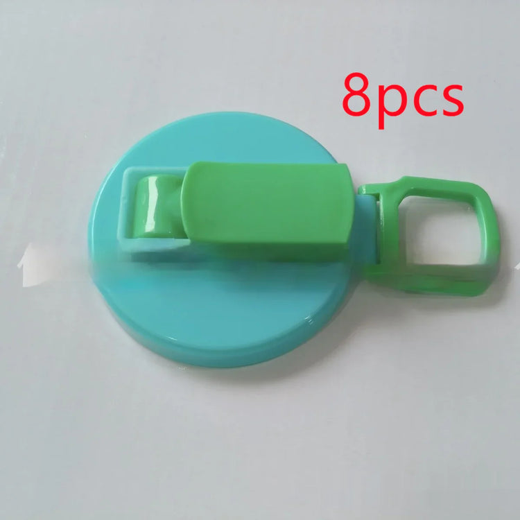 Blue and green round plastic clip with handle, 8 pieces, on white background