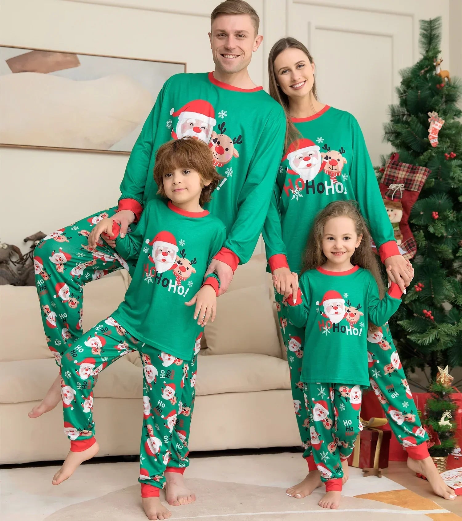 Family wearing green Christmas pajamas with Santa print, long sleeves, relaxed fit, soft material