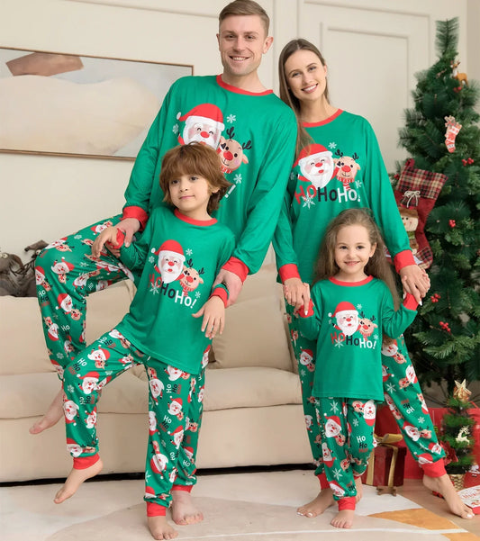 Family wearing green Christmas pajamas with Santa print, long sleeves, relaxed fit, soft material