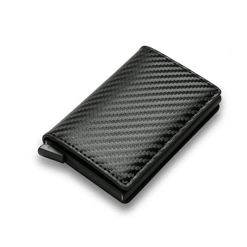 Black carbon fiber minimalist wallet with textured finish, slim and modern design