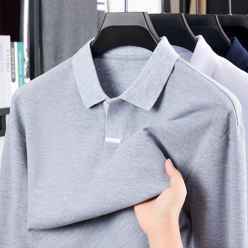 Light gray cotton polo shirt with a relaxed fit and soft texture on hanger