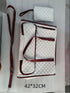 Quilted white and red travel bag set with adjustable straps and zippered pouches, 42x32 cm