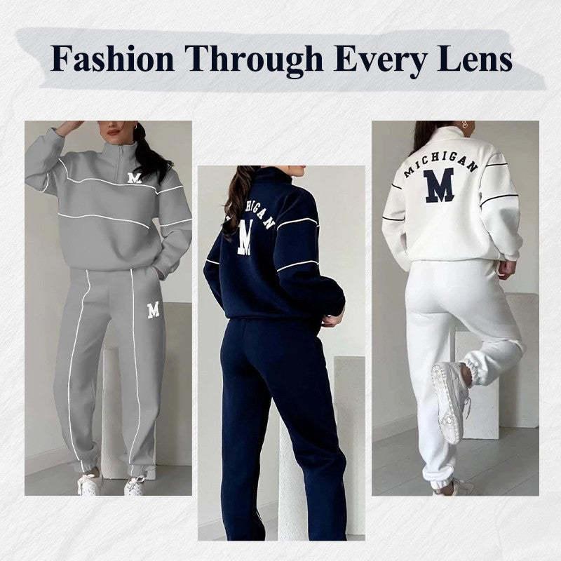 Women wearing oversized tracksuits in grey, navy, and white with contrast piping and M logo.