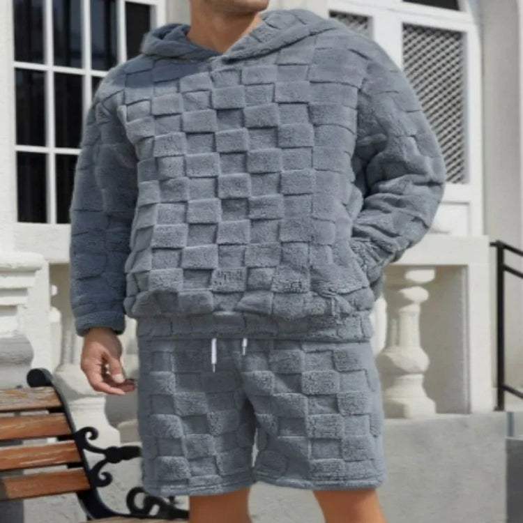 Man wearing grey textured fleece hoodie and shorts set, relaxed fit streetwear