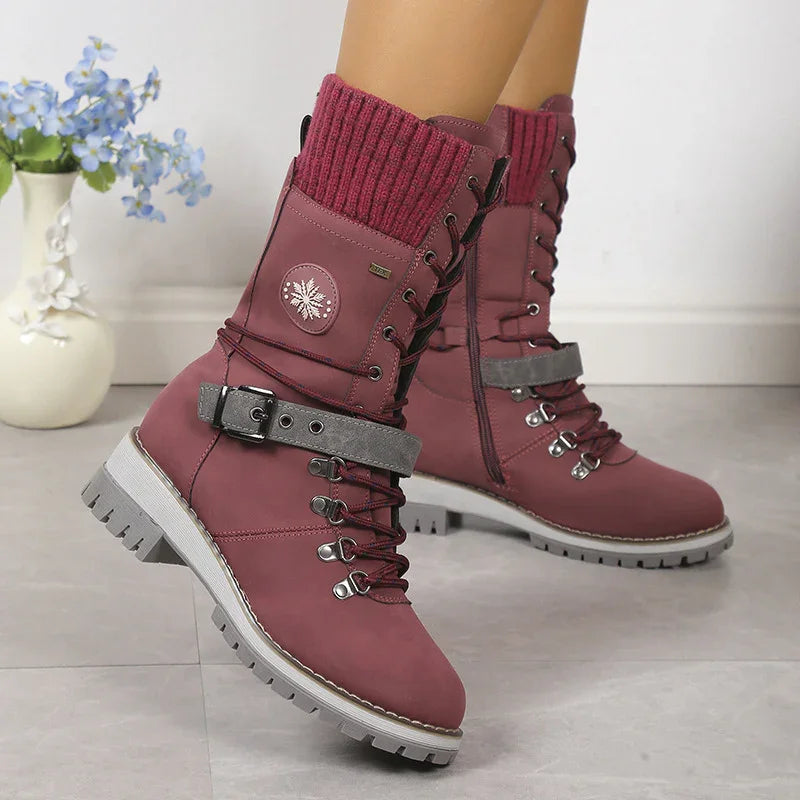 Burgundy lace-up winter boots with chunky sole, knit ankle cuff, and buckle strap detail