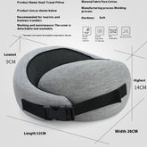 Gray ergonomic travel pillow in soft cotton fabric with adjustable strap, modern design