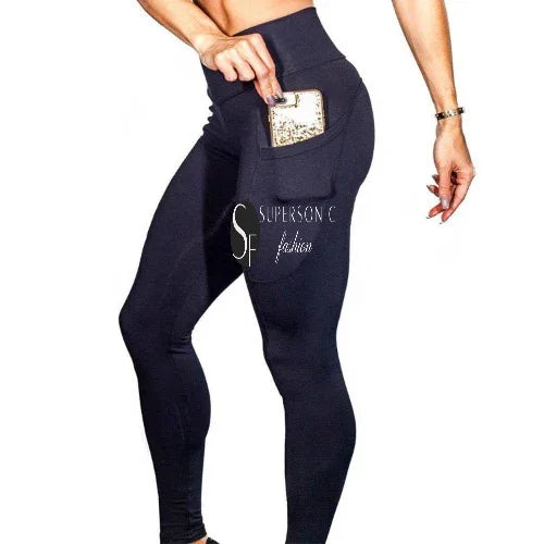 High-waisted black leggings with side pocket and snug fit, ideal for active streetwear style