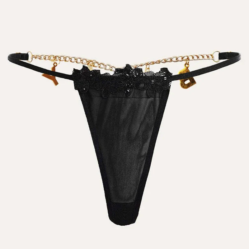 Black mesh thong with floral lace trim and gold chain waist detail, minimal fit lingerie.