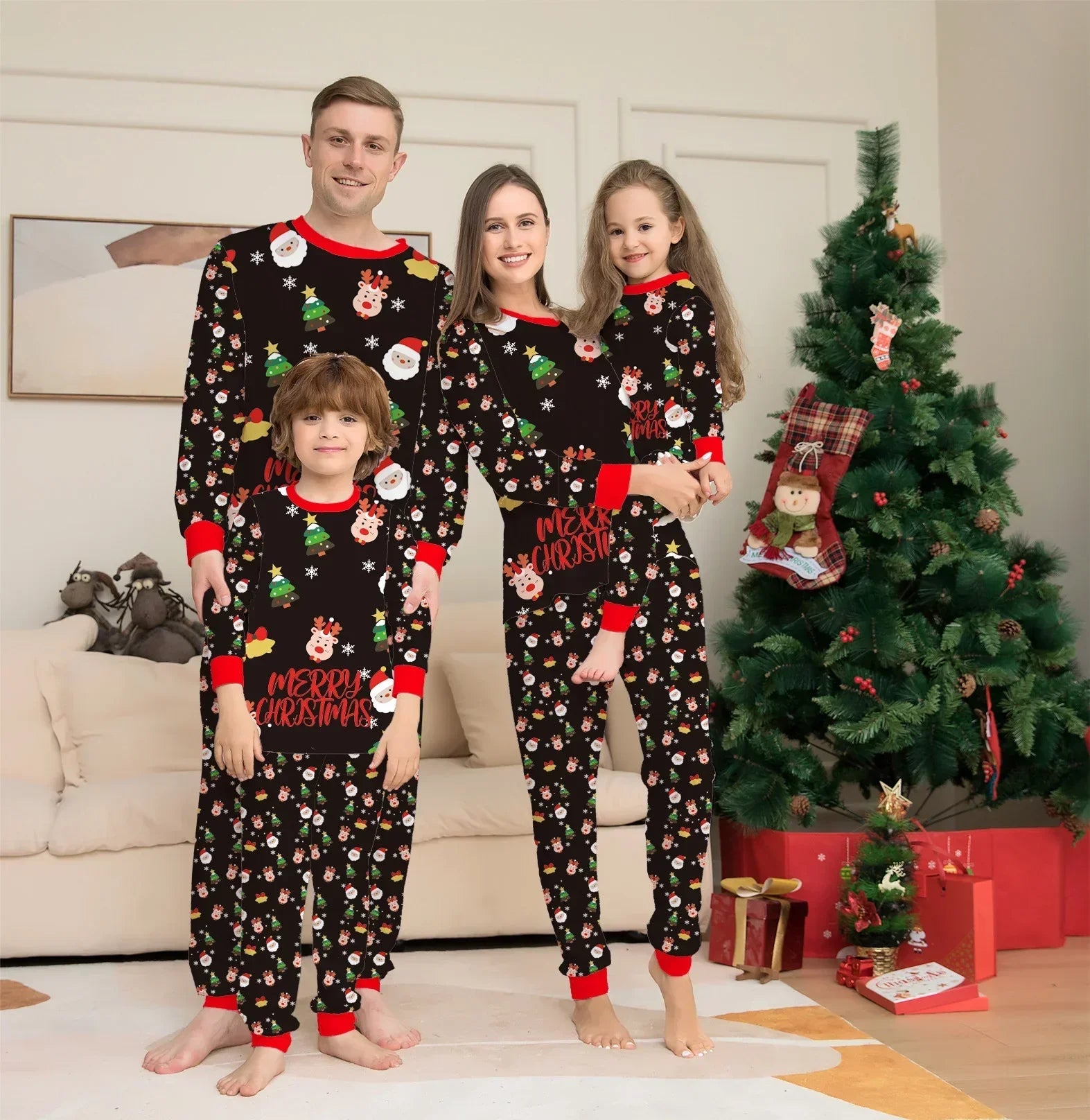 Family wearing matching black Christmas pajama sets with festive patterns and red trim