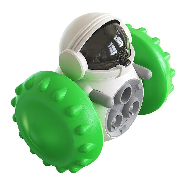 Futuristic toy robot car with green textured wheels and a white astronaut-shaped body