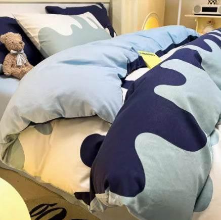 Modern bedding set with blue and navy wavy pattern, cotton material, relaxed fit