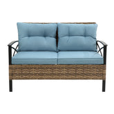 Outdoor wicker loveseat with light blue cushions and black metal armrests, modern design
